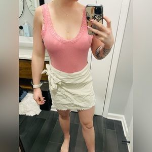 Thick lace strapped pink bodysuit